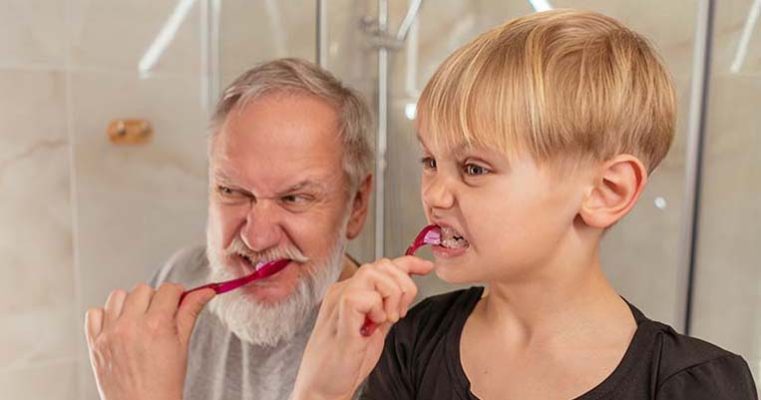 Grandfather and grandson in multi-generational home in Sydney