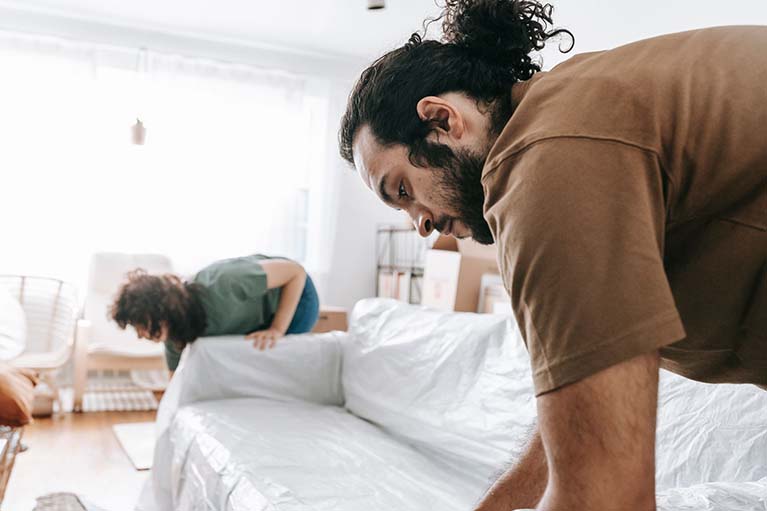Couple preparing their home before major renovation work starts